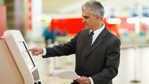 Steps on airport kiosk check-in for Singapore Airlines flights